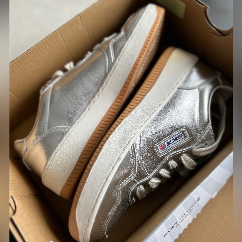 Trendy Skechers Metallic Silver Low-Top Sneakers with Gum Sole